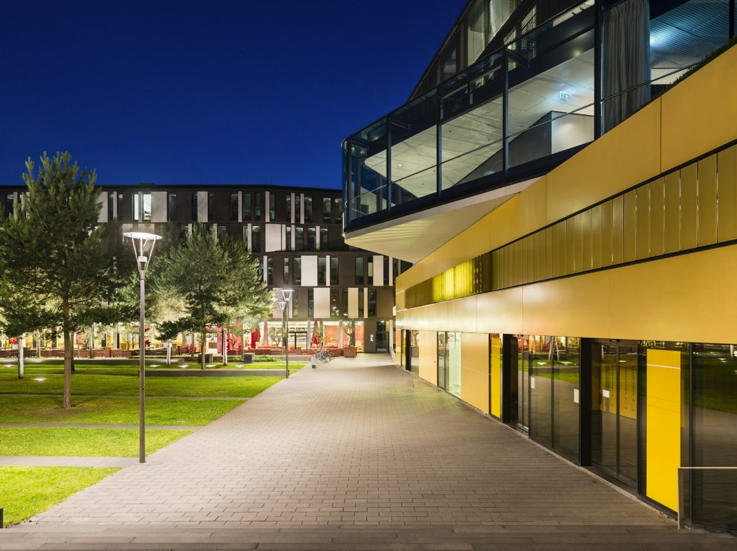 Modern City Buildings In Aachen, Germany At Night